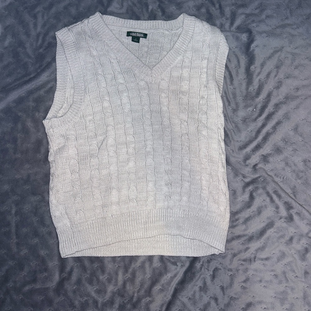 White knitted sweater vest